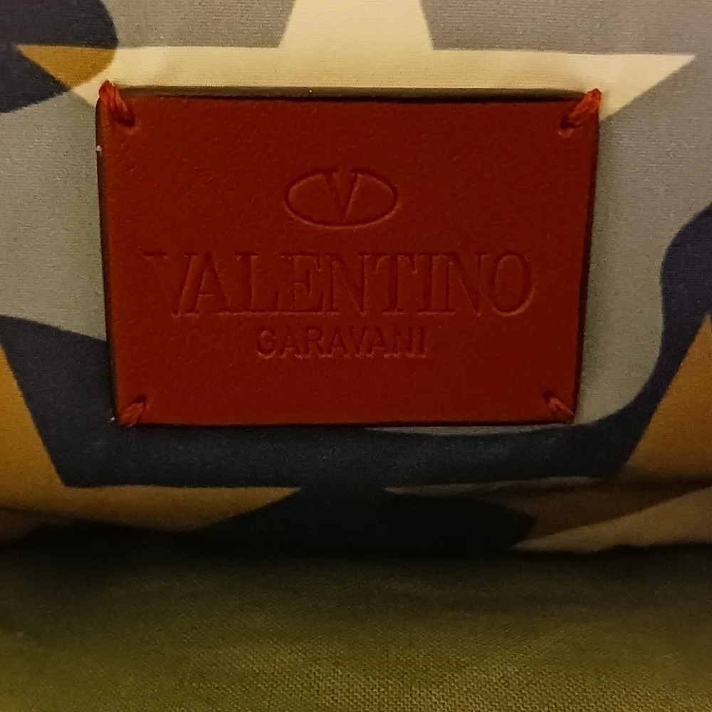 Valentino Garavani pouch.